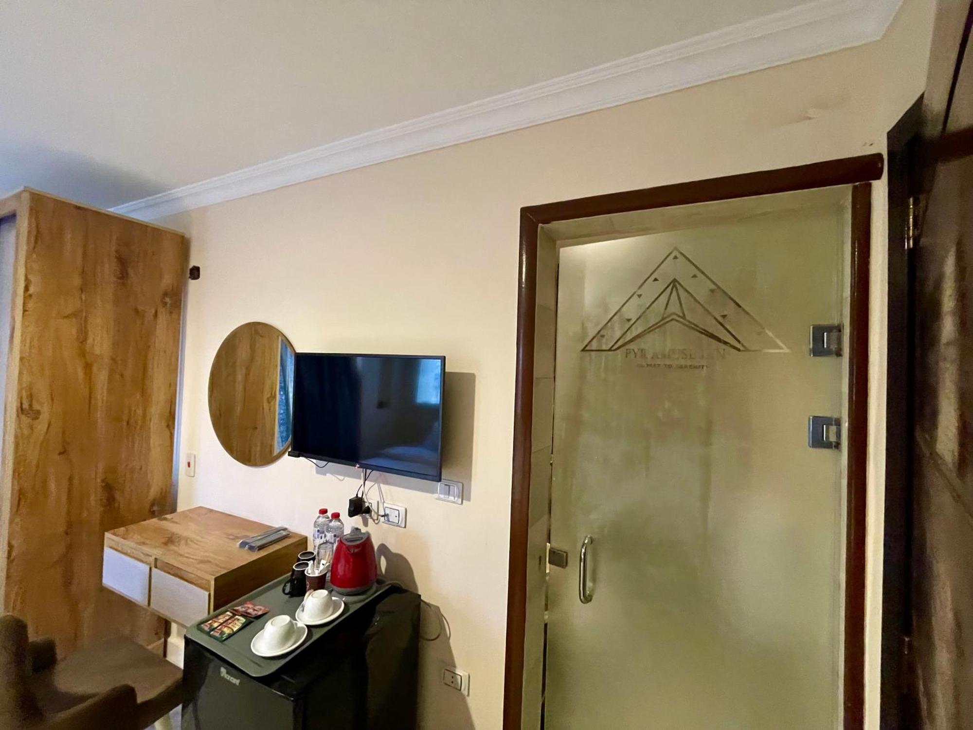 Pyramuse Inn Nazlat as Sammān Buitenkant foto